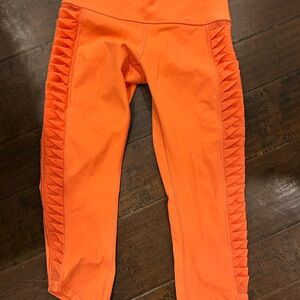 Orange ruched Lululemon leggings. Size 6
